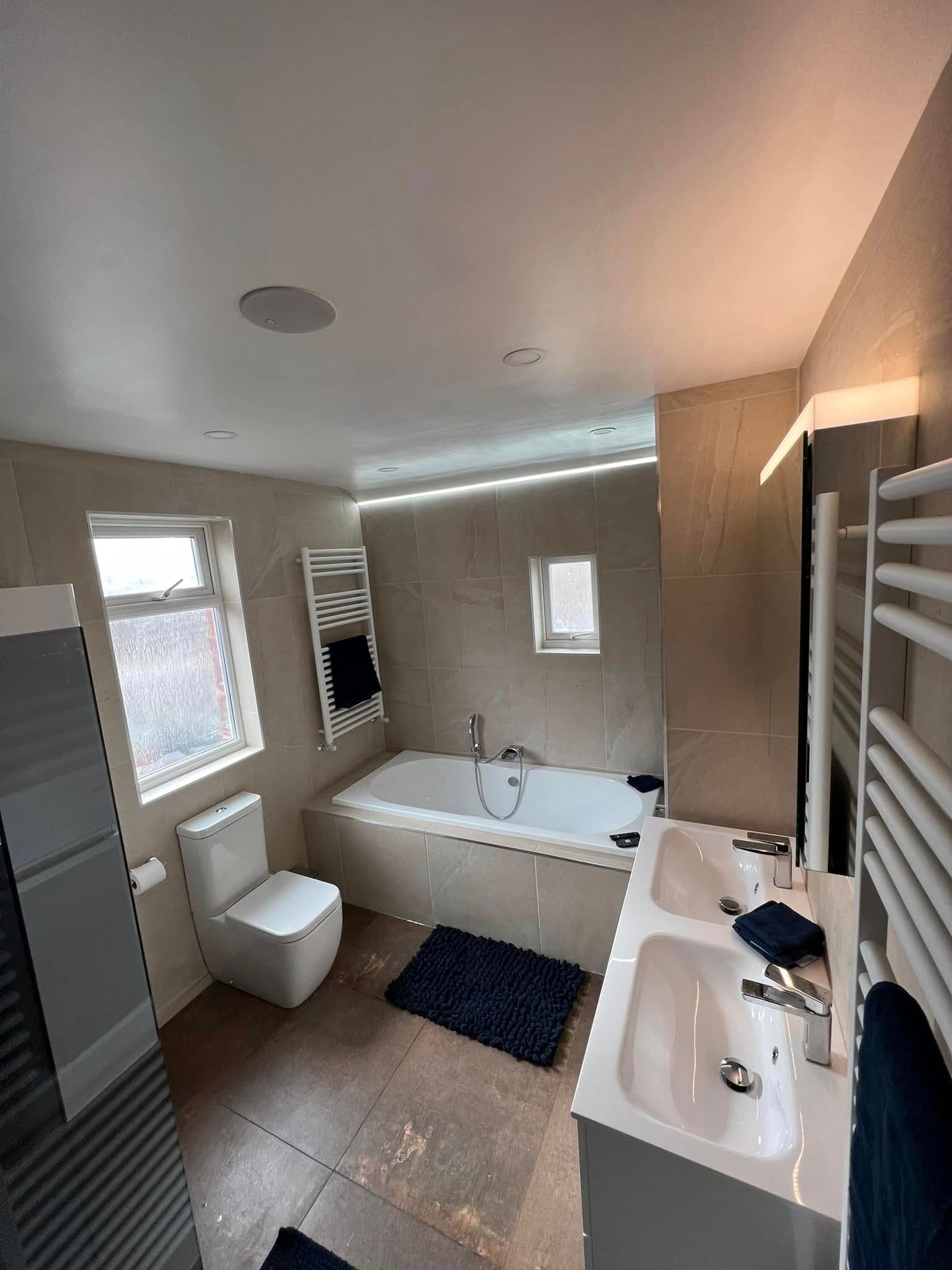 Family bathroom, twin basin and recessed lighting